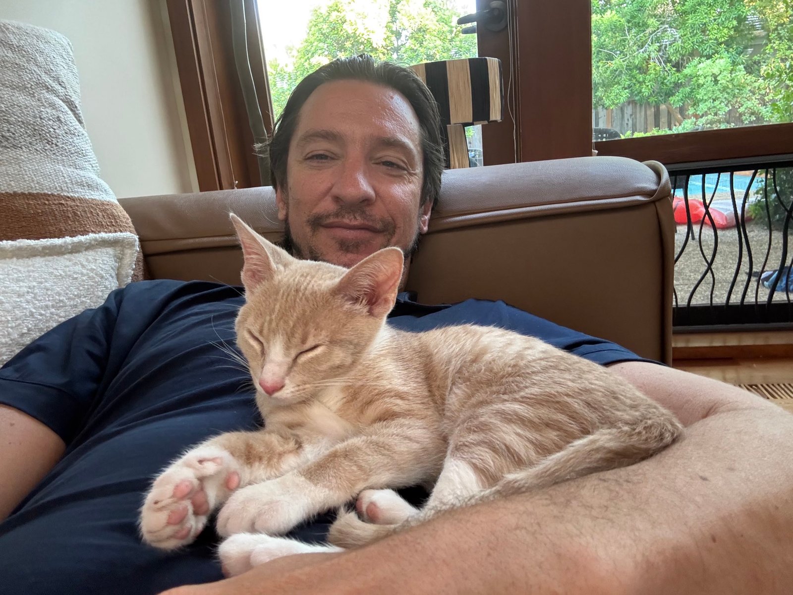 Nice Cat sleeping on Benn Eifert
